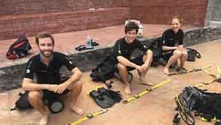 PADI Reactivate Scuba Refresher Program divers setting up weightbell