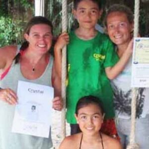 PADI Bubblemaker Program family on beach with certification